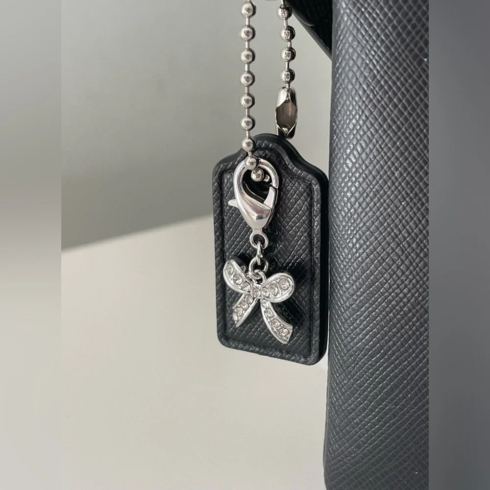 Coach Bow wristlet | Black Leather